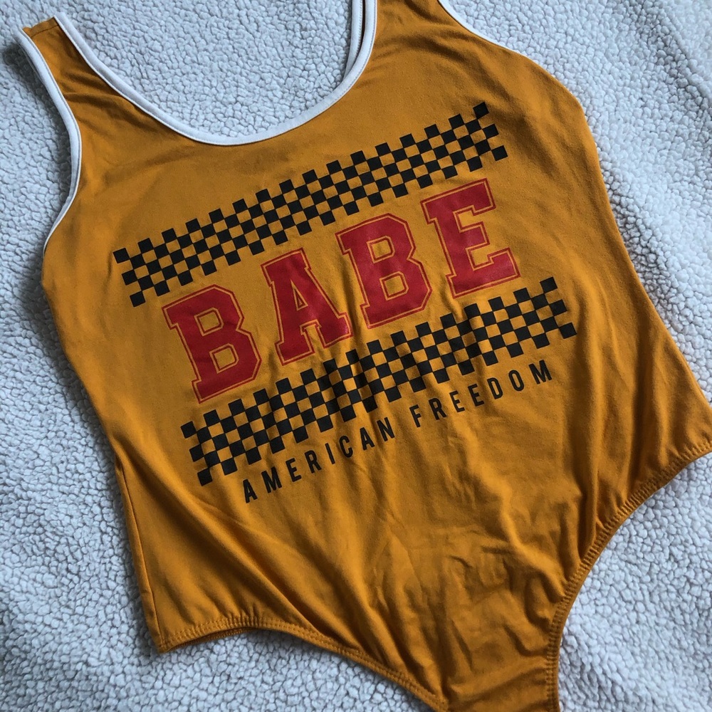 NOT FOR SALE RIGHT NOW! 
Yellow/Mustard Charlotte Russe Bodysuit. Size L